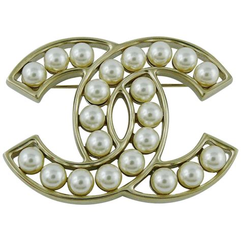 chanel cc brooch uk|chanel brooch price.